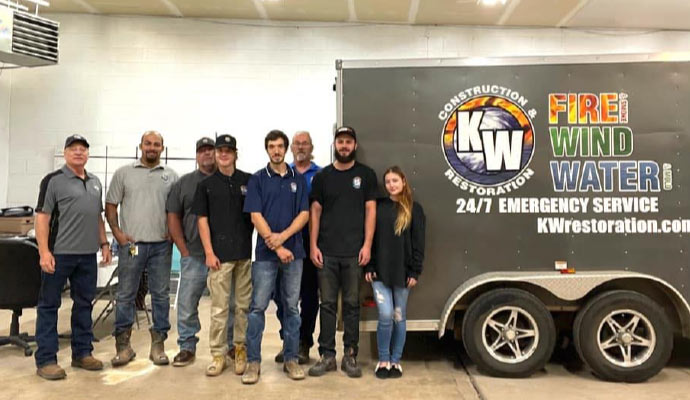 colorado water restoration team with service vehicle 